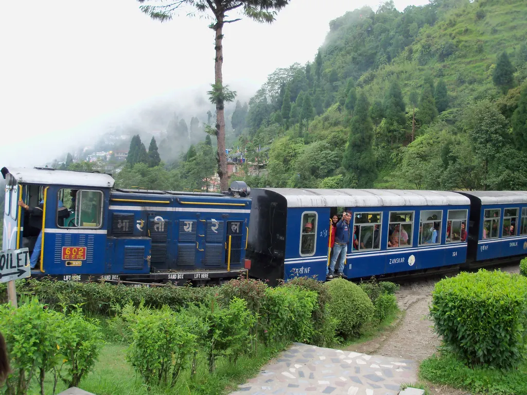 Blue Darjeeling Himalayan Railway toy train at Batasia Loop